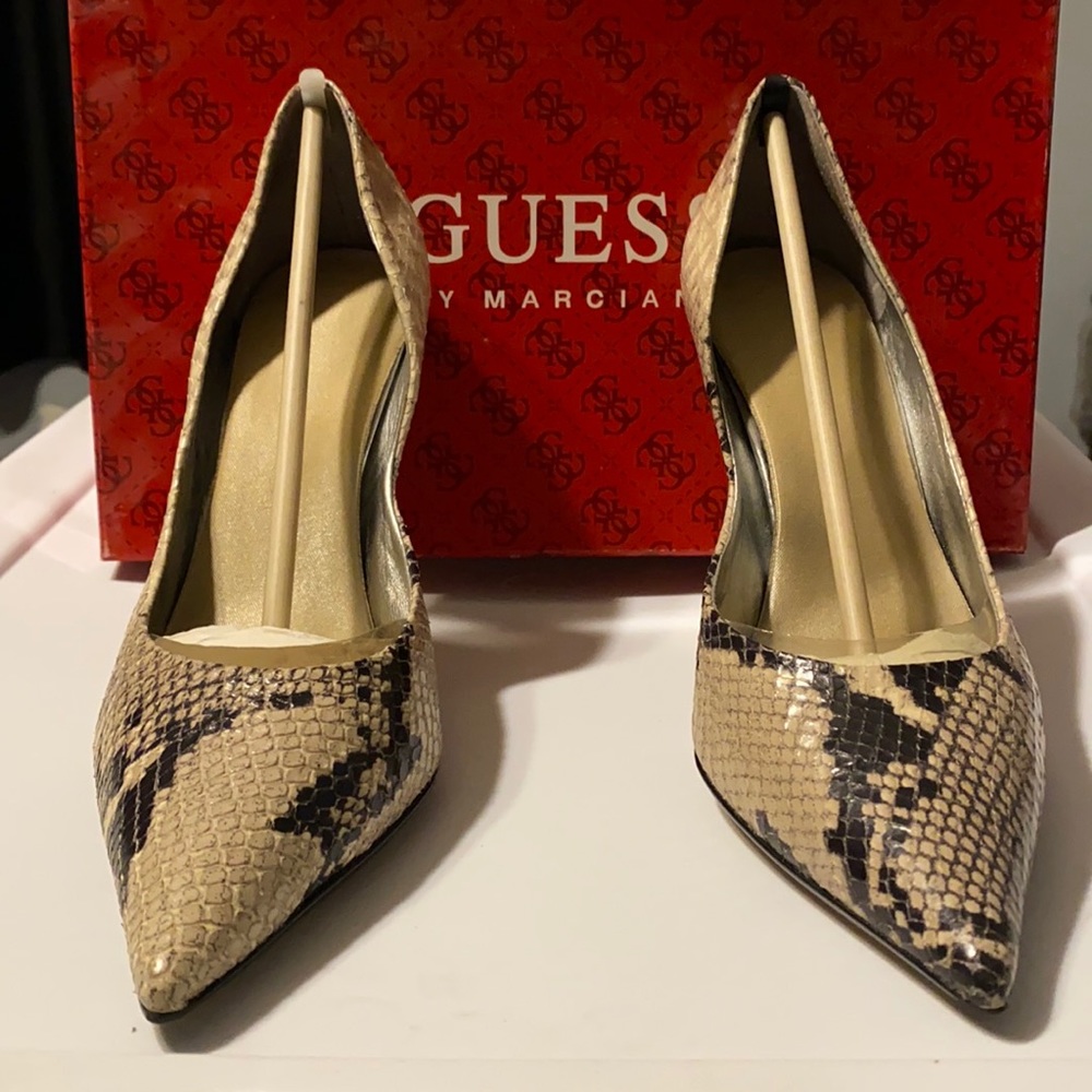 Beige and black snake skin heels